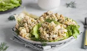Salad with canned squid, rice and eggs