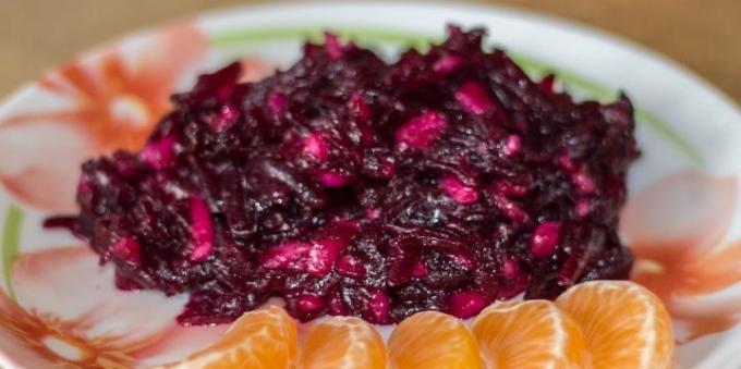 Salad with prunes, beets, pear and honey dressing