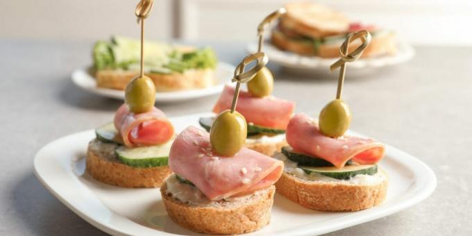 Canape with ham and cucumber