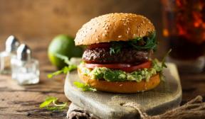 Beef burger with guacamole and tomato