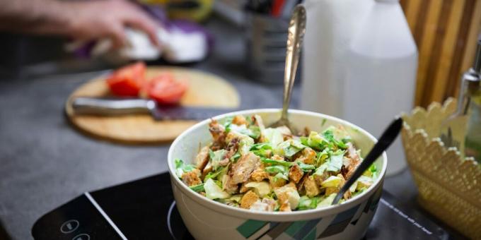 Salad with chicken, cucumber, celery and croutons