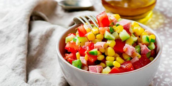 Salad with ham, cucumbers, tomatoes and corn