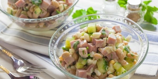 Salad with beans, ham, cucumber and eggs