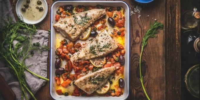 Fish baked in the oven with tomatoes and peppers