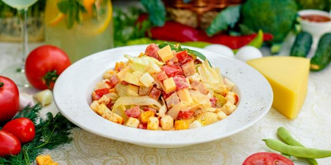 Salad with chicken, tomato, Chinese cabbage, cheese and croutons
