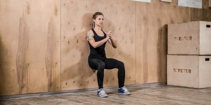 morning exercises: isometric squat against the wall