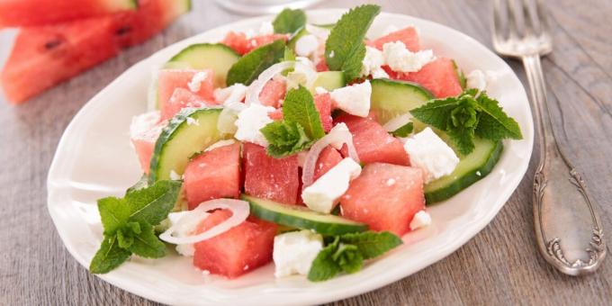 Salad with watermelon, feta, cucumber and honey dressing