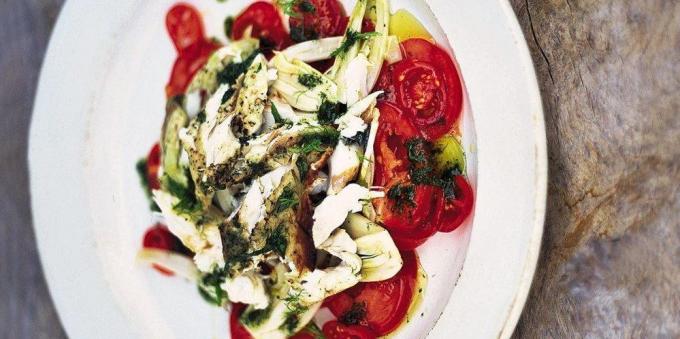 Warm fish salad with fresh vegetables
