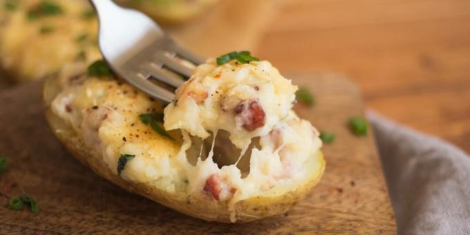 Stuffed potatoes with cheese, sour cream and bacon