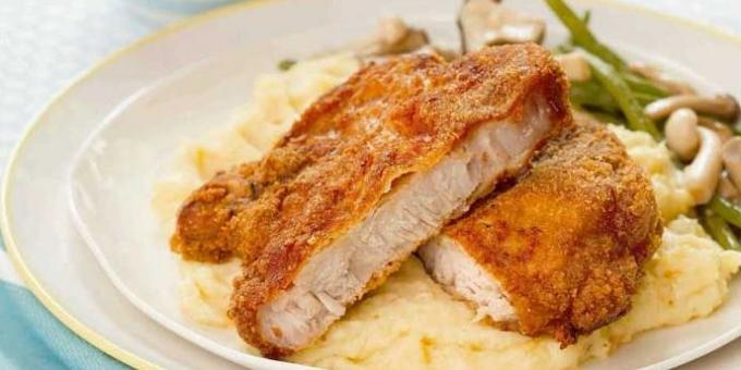 Pork chops with walnuts and cheese