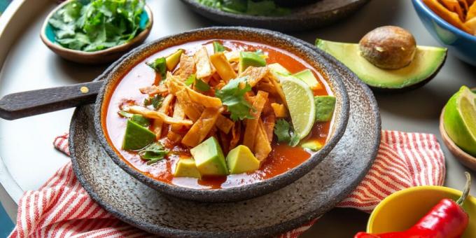 Mexican tomato soup with chicken, corn and tortillas