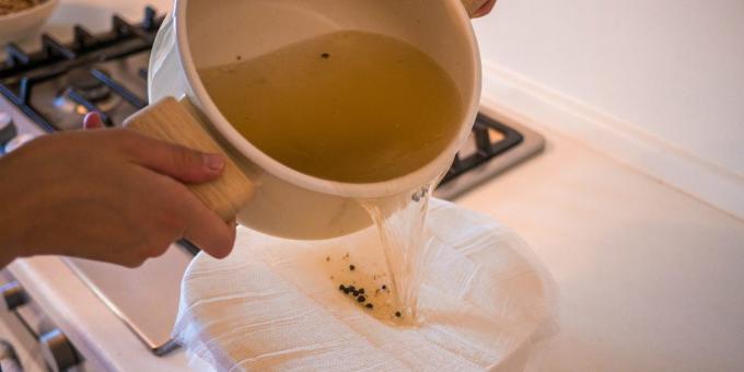 How to cook chicken broth: Strain the broth through cheesecloth