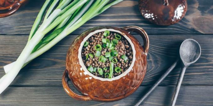 Buckwheat with chicken and mushrooms in pots