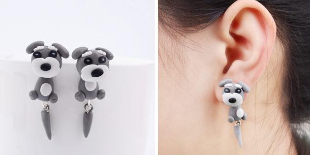 Earrings in the form of a dog with a movable tail