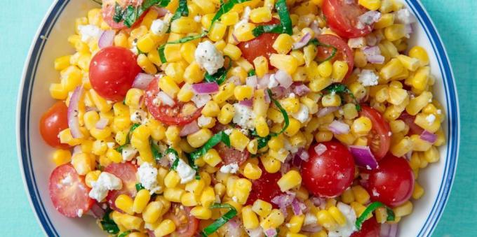 Vegetable salad with corn, tomatoes and feta cheese