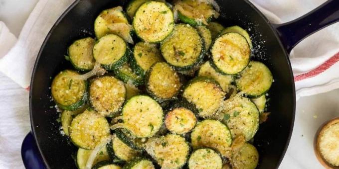 Fried zucchini with onion, thyme and cheese