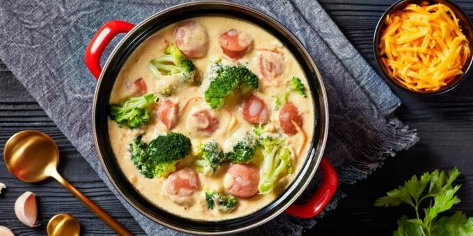 Cheese cream soup with sausages and two types of cabbage