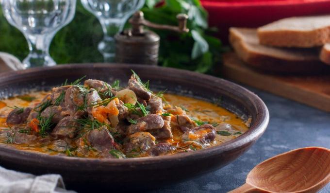 Chicken hearts stewed with carrots and onions