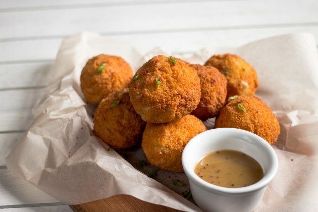 Serve the finished potato balls with the sauce