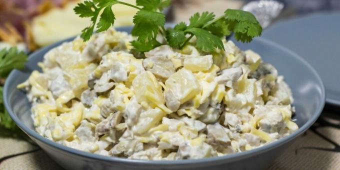 Salad with chicken, pineapple and pickled mushrooms