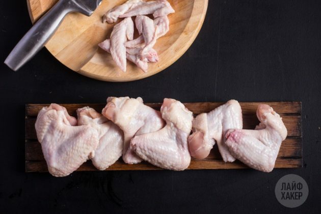 Rinse, dry and chop the chicken wings