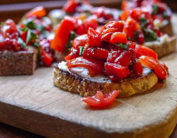 Bruschetta with cheese and baked peppers