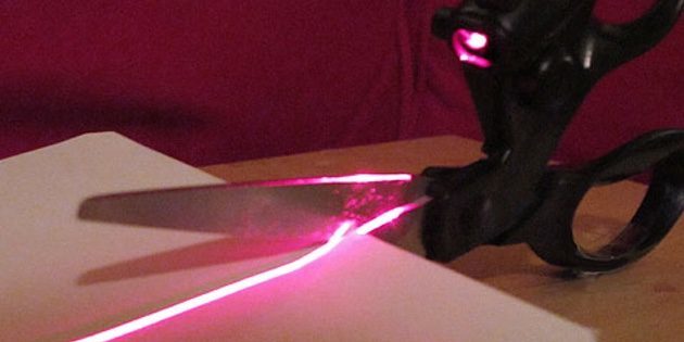 Scissors with laser pointer