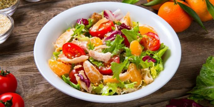 Low calorie salad with chicken, tangerines and cheese
