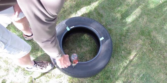 Swing your arms: Drill holes in tire