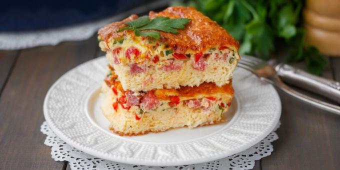 Omelet with sausage, tomatoes and cheese in the oven