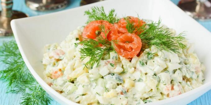 Salad with red fish, eggs and cucumbers