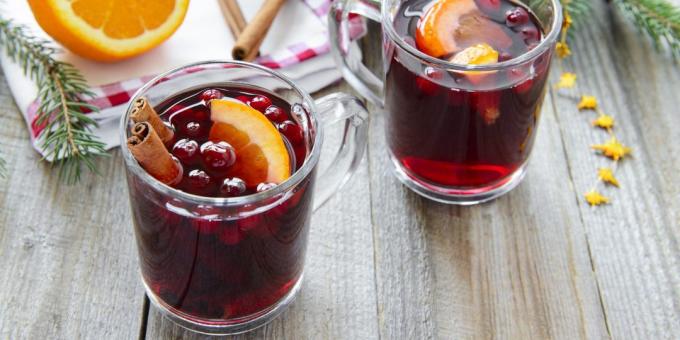 Non-alcoholic mulled wine to grape juice with orange, lemon and cranberries