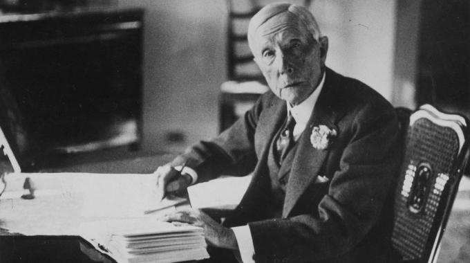 John D. Rockefeller at work