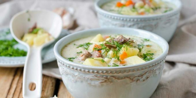 Cheese soup with smoked meats in a slow cooker