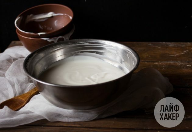 To make homemade yogurt-based cream cheese, combine sour cream and yogurt