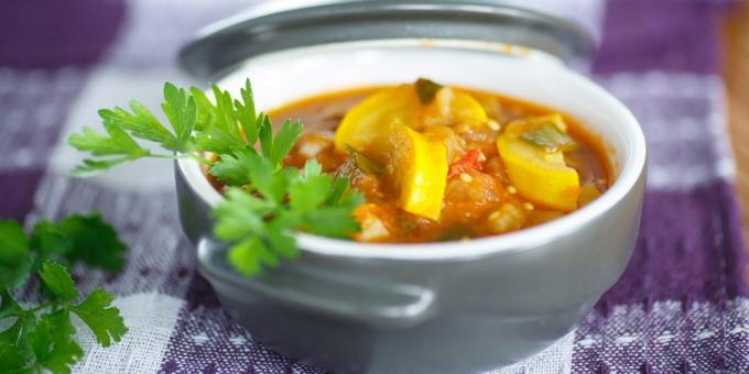 Fried zucchini with beans and tomatoes