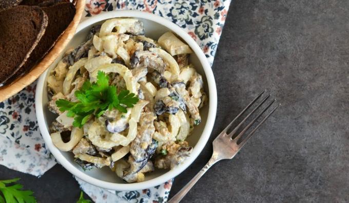 Salad with squid, mushrooms and eggs