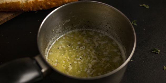 How to Make Garlic Cheese Croutons: Melt the Butter with Chopped Garlic and Fresh Herbs