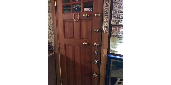 door with a variety of pens