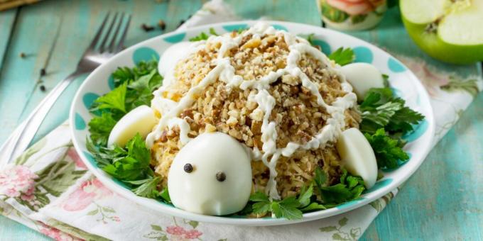 Turtle salad with walnuts, prunes and chicken
