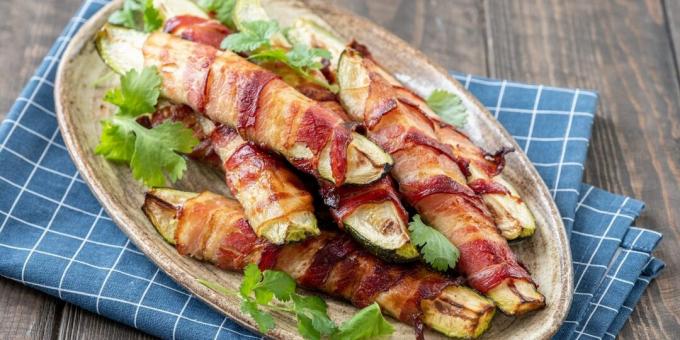 Zucchini with bacon baked in the oven