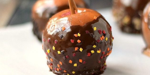 Caramel apple with chocolate and sprinkles