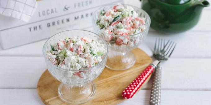 Salad with crab sticks, cottage cheese and cucumber