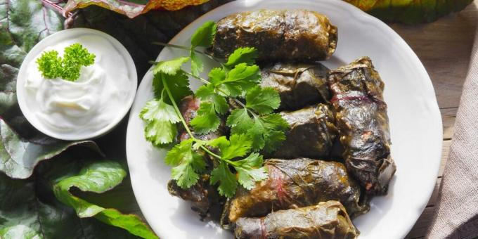 Dolma with meat and rice in beet leaves