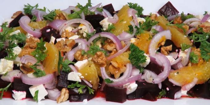 Salad of boiled beets with orange, nuts, feta cheese and citrus-honey dressing