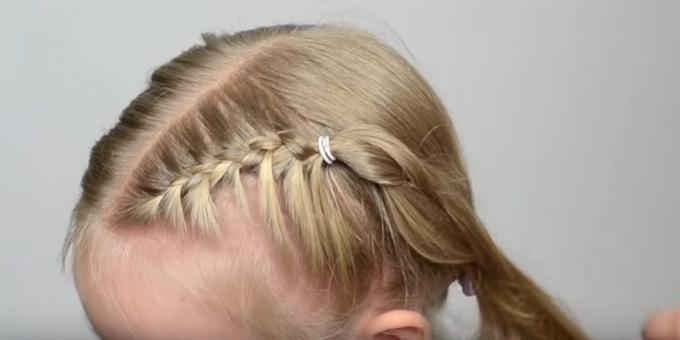 On top of her hair loose, take three thin strands and braid classic spike