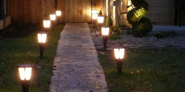 Garden walkway with lamps
