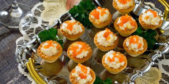 Tartlets with squid, eggs and red caviar