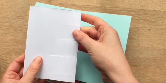 Make four cuts on a white sheet