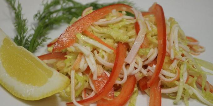 Salad with crab sticks, cabbage, pepper and apple